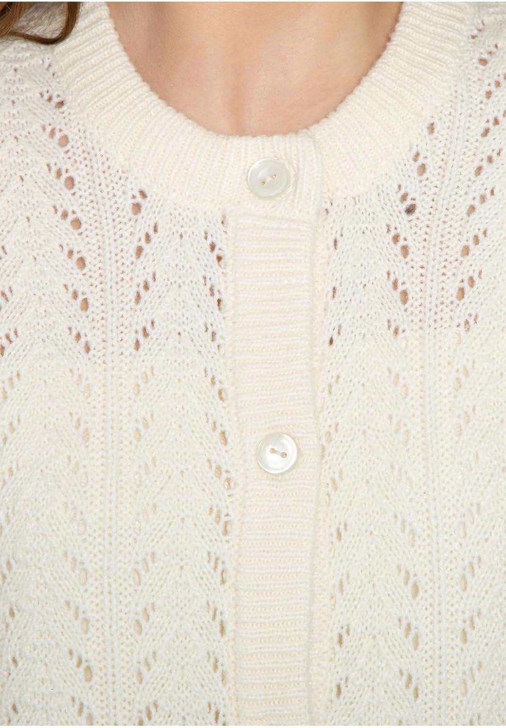 Ivory crochet pointelle cardigan close-up of button front and knit eyelet pattern