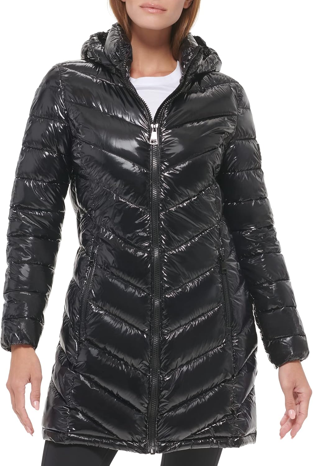 Women’s long shiny puffer jacket in black with hood, full zipper, and zip pockets