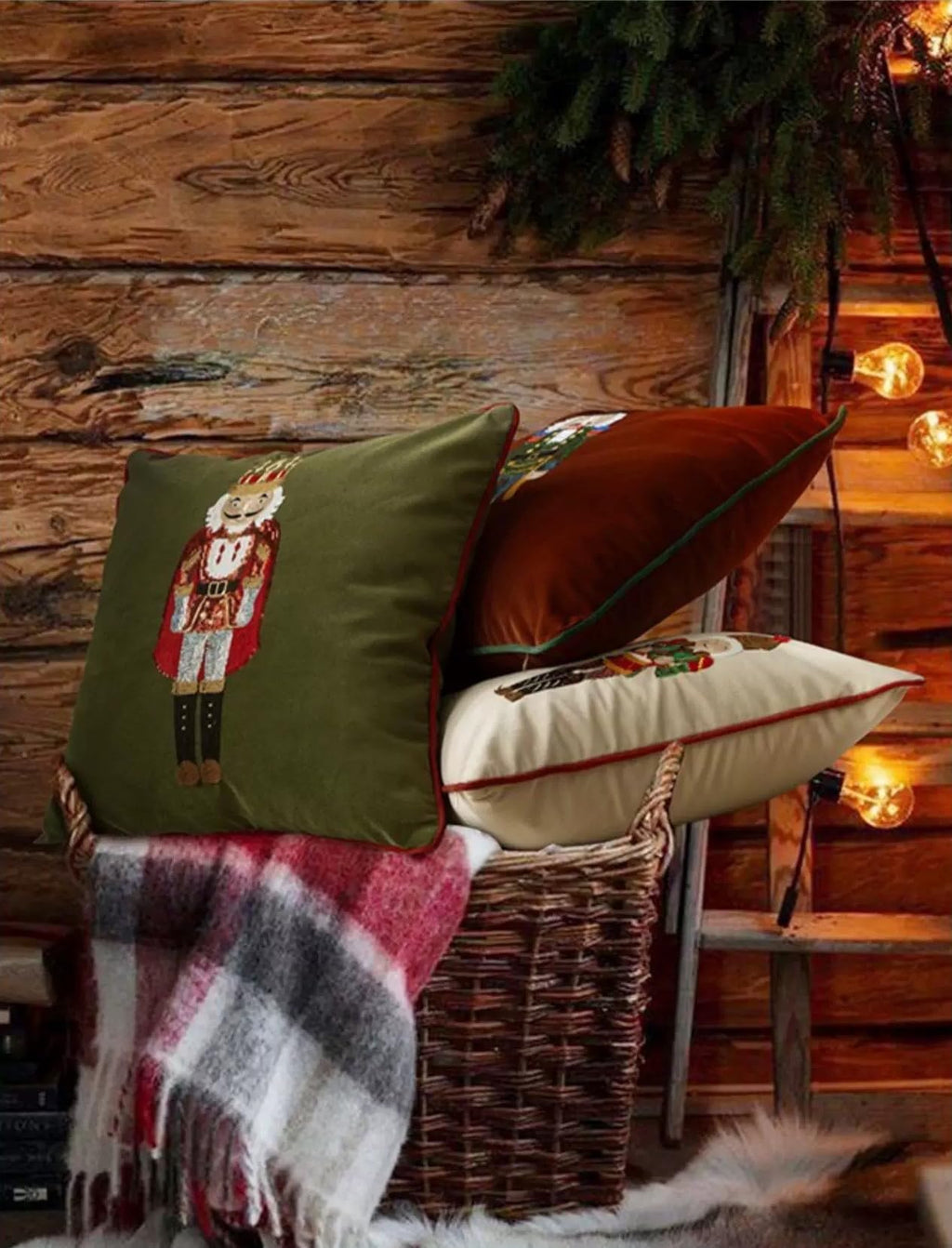 Green velvet nutcracker pillow cover with embroidered figure and dark red piping border