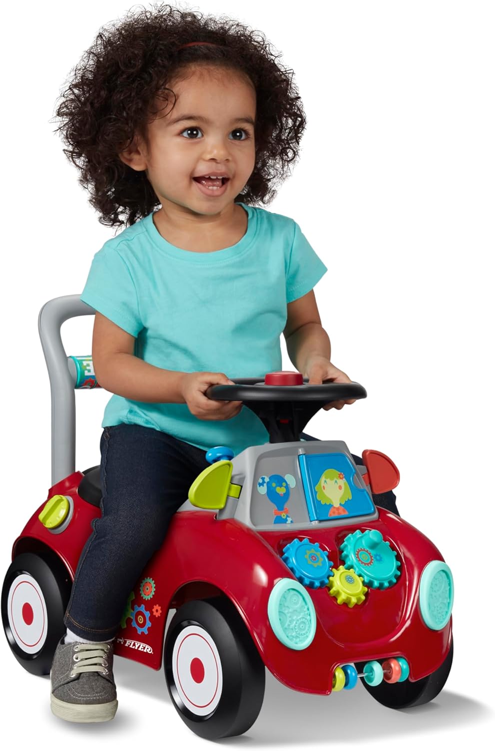 Red toddler sit-to-stand ride-on car with interactive dashboard and push-along handle