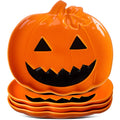Orange jack-o'-lantern ceramic candy dish with smiling face