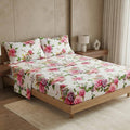 Rose floral sheet set with pink roses on white, coordinating pillowcases