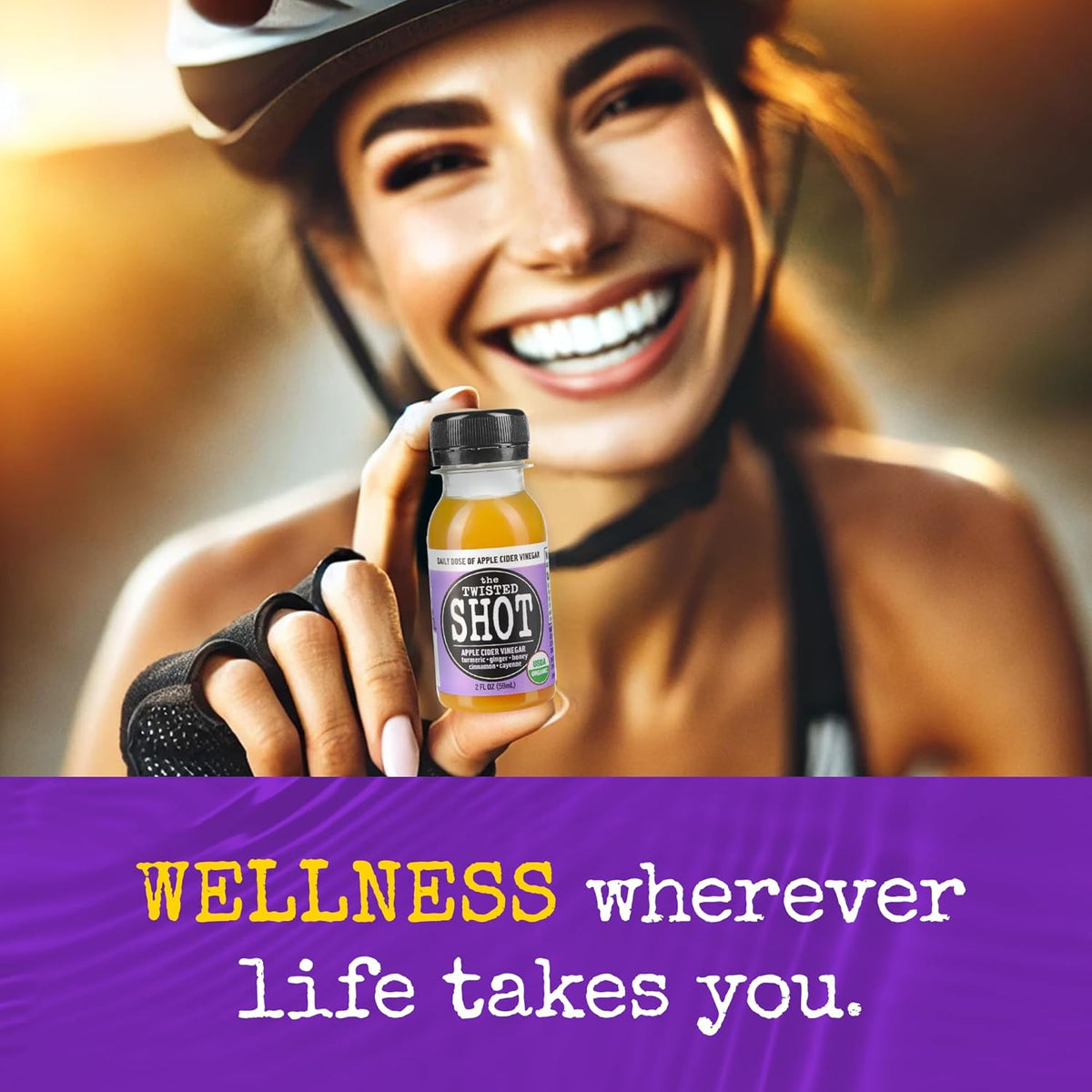 Twisted Shot apple cider vinegar wellness shot bottle held by a smiling person