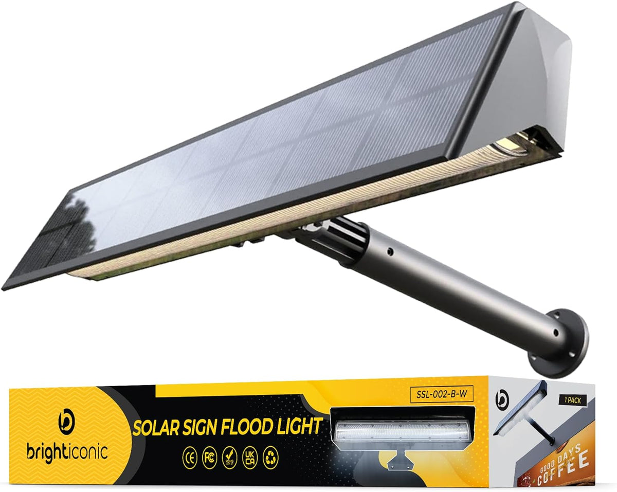 Solar sign flood light in black finish with slanted solar panel and black arm