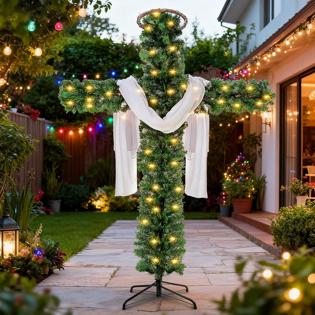Pre-lit cross-shaped artificial pine tree with white drapes and warm yellow lights for outdoors