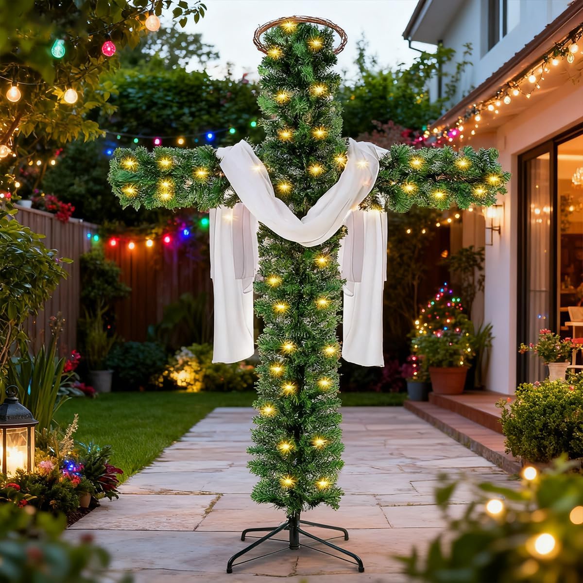 Pre-lit cross-shaped artificial pine tree with white drapes and warm yellow lights for outdoors