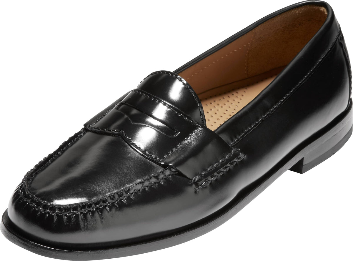 Men's black penny loafer shoes with apron stitching and slip-on design