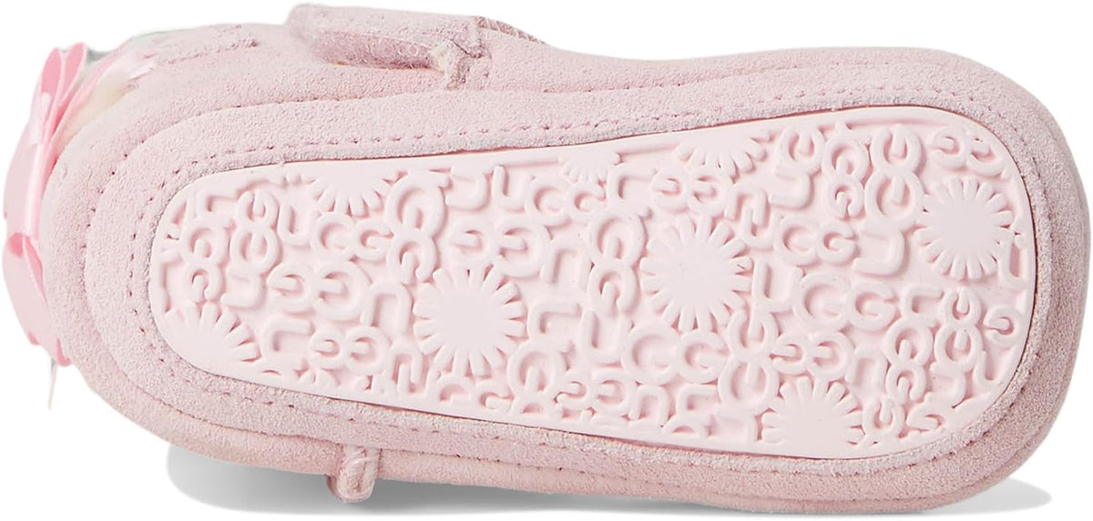 Pink baby suede booties with embossed rubber sole pattern