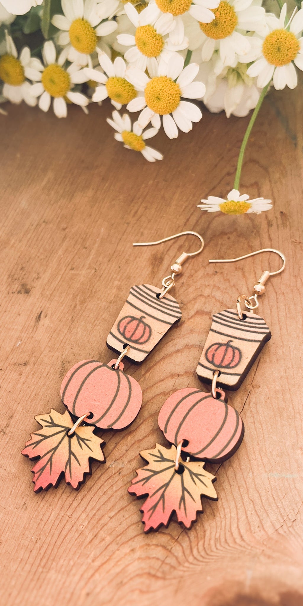 Wood earrings featuring pumpkin spice coffee cup, pumpkin, and autumn leaf charms