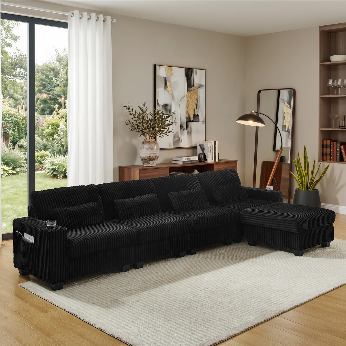 Black corduroy L-shaped modular sectional sofa with chaise and detachable footrest