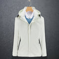 Men's off-white waterproof hooded jacket on hanger, zip front and adjustable cuffs.