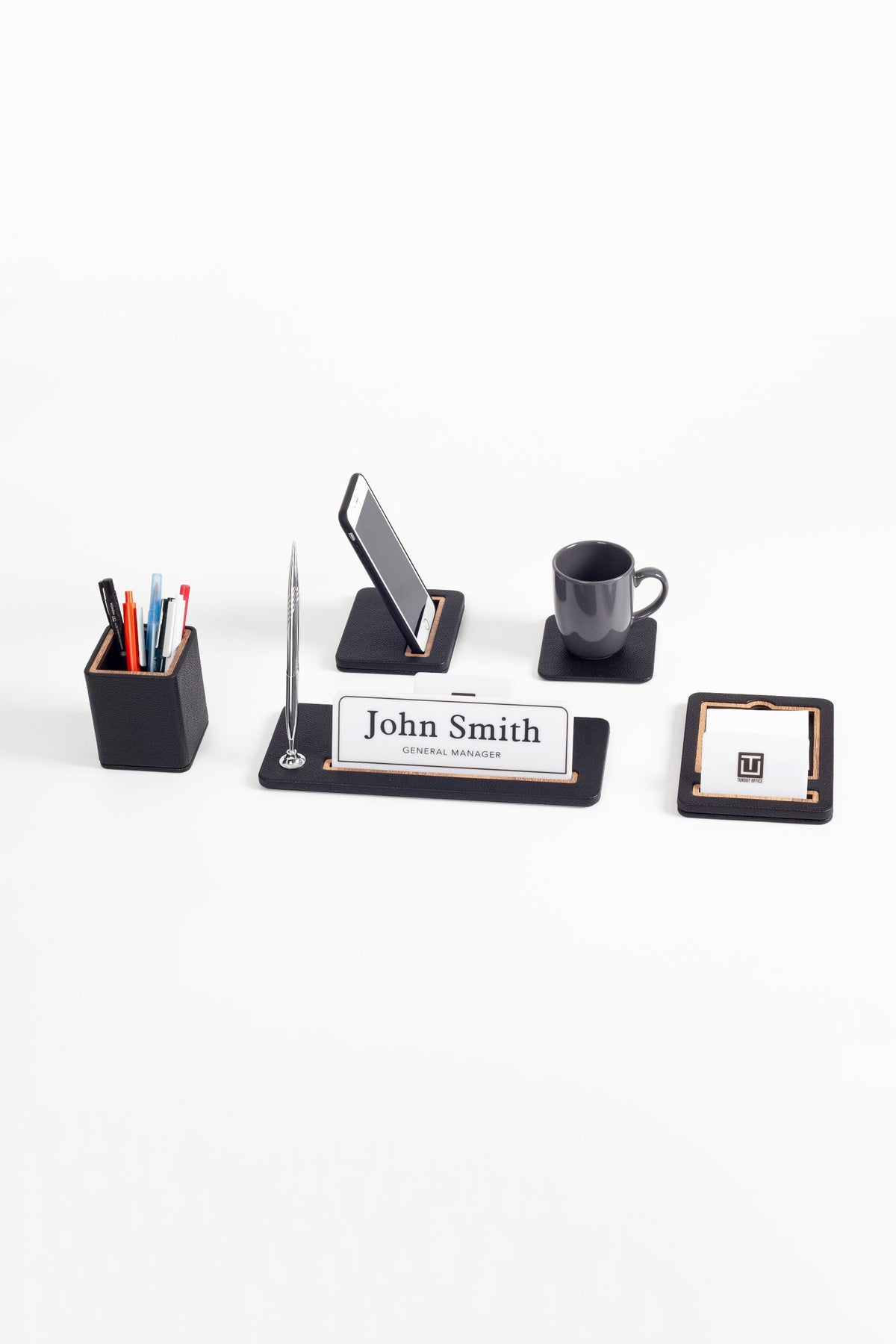 Black wood desk name holder set featuring pen cup, nameplate, photo stand, mug, name card