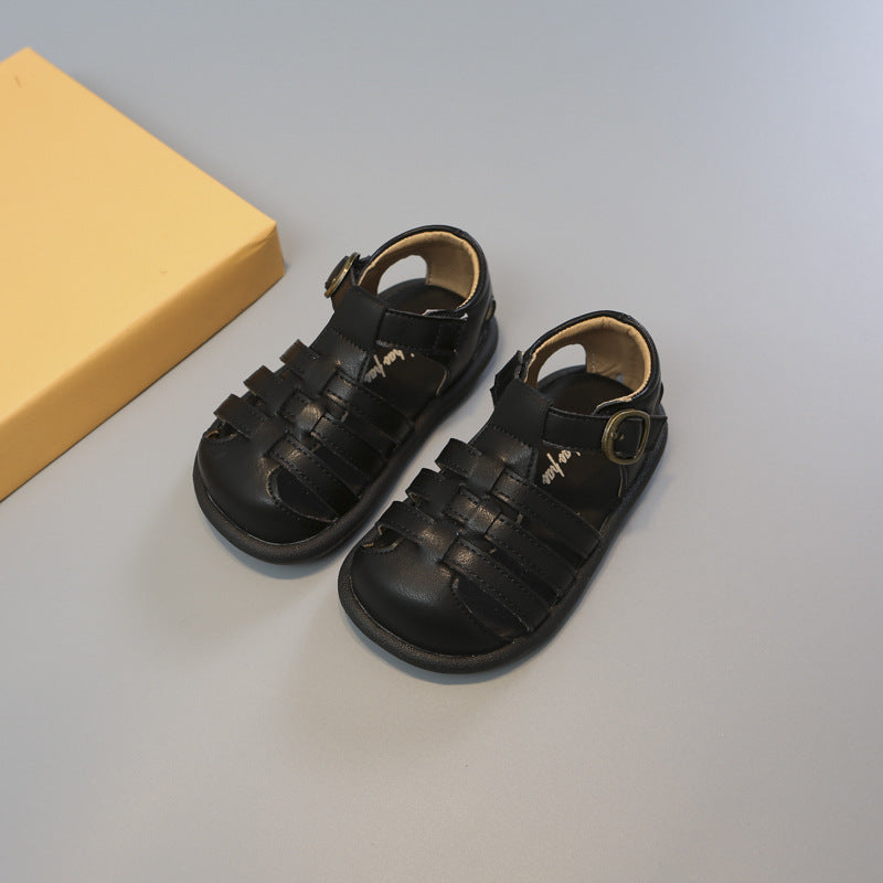 Black toddler closed-toe woven sandals with hook-and-loop ankle strap