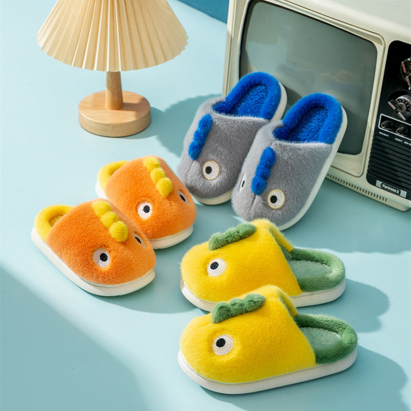 Children’s plush dragon slippers, gray with blue horns and green accents