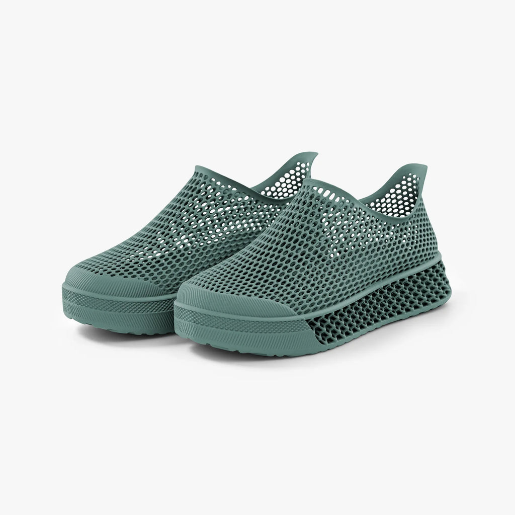 Teal 3D-printed casual sneakers with perforated mesh upper and slip-on design
