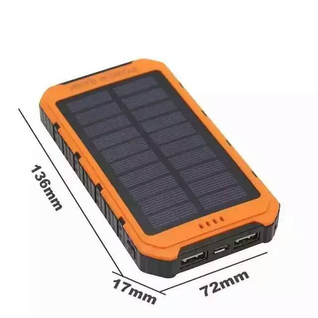 Orange rugged solar power bank showing side with USB ports and built-in solar panel.
