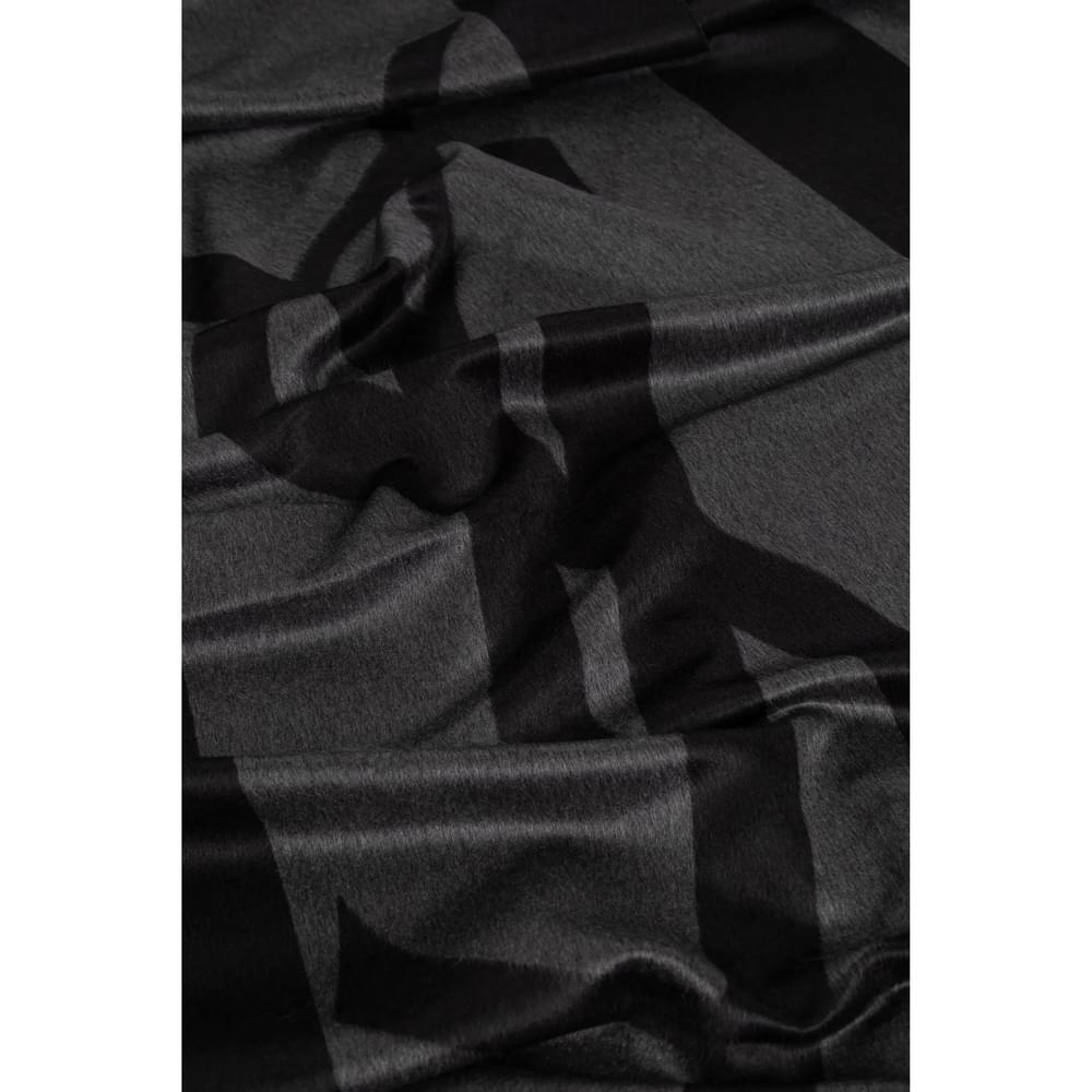 Saint Laurent gray scarf fabric close-up with bold stripe pattern