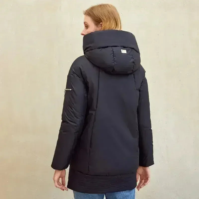 Black hooded padded parka back view with center zipper and full-length sleeves