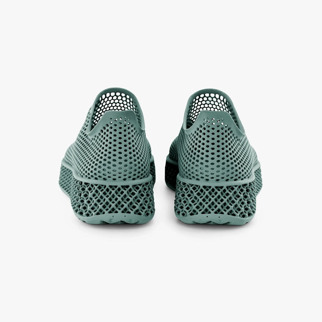 Teal 3D-printed casual sneakers, rear view with perforated upper and cushioned heel