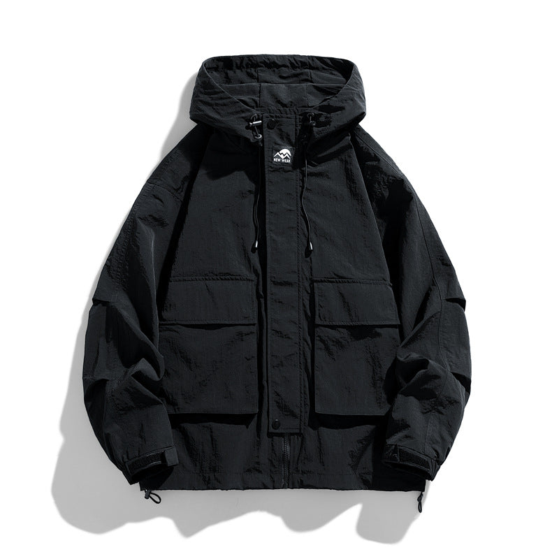 Black hooded zip-up work jacket with front pockets and adjustable drawstring hood