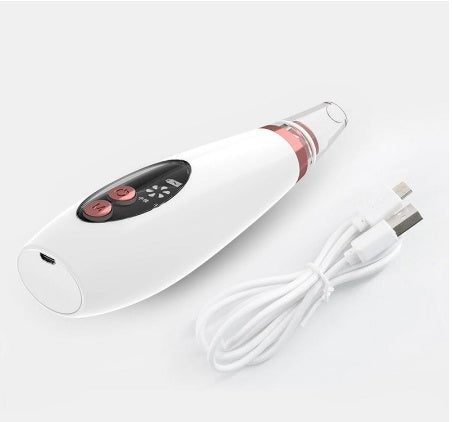 White handheld facial vacuum device with rose-gold band and USB charging cable