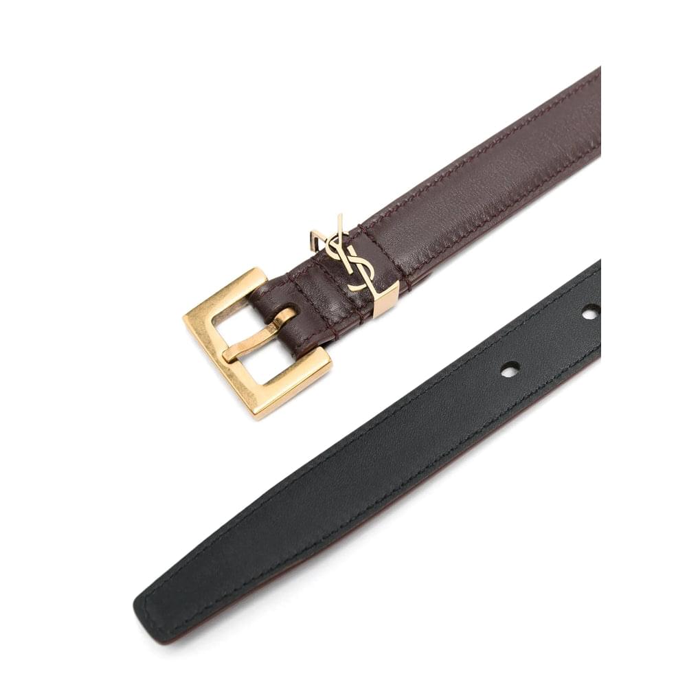 Women’s Saint Laurent belt strap with gold-tone buckle and visible adjustment holes