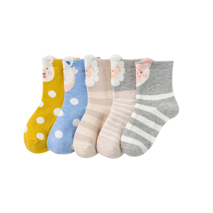 Pack of children’s tube socks in yellow, blue, beige, and gray with playful patterns