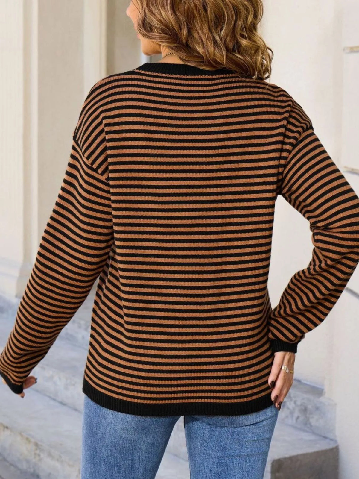 Black-and-tan striped round-neck sweater, back view, long sleeves