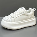 Leather shell-toe low-top sneakers, white with thick sole and lace-up upper