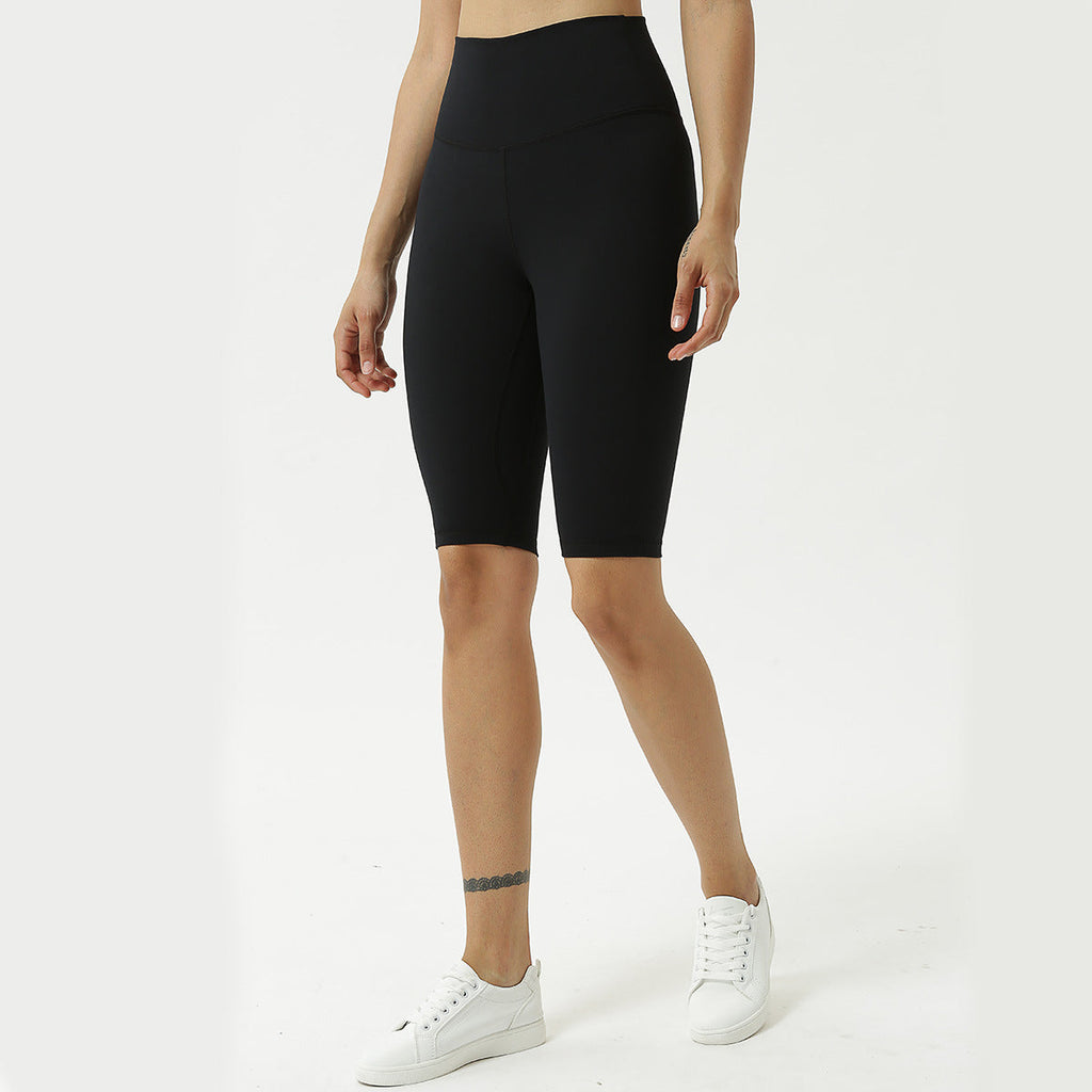 High-waist black yoga capri pants, full front view