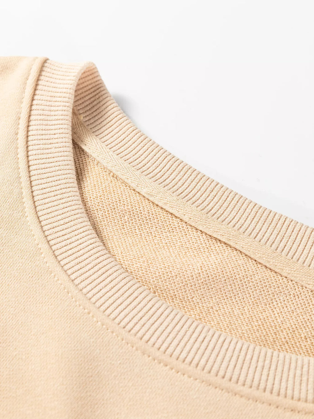 Beige sweatshirt collar and ribbed neckline with stretchy knit cuffs