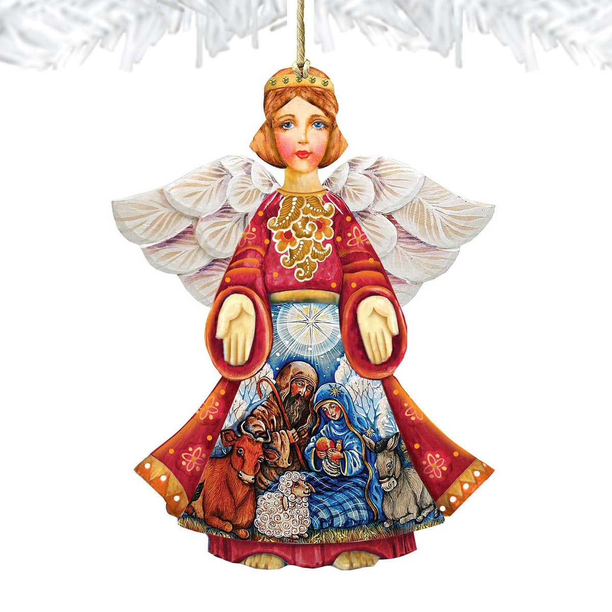 Nativity angel wooden ornament with white wings and painted manger scene.