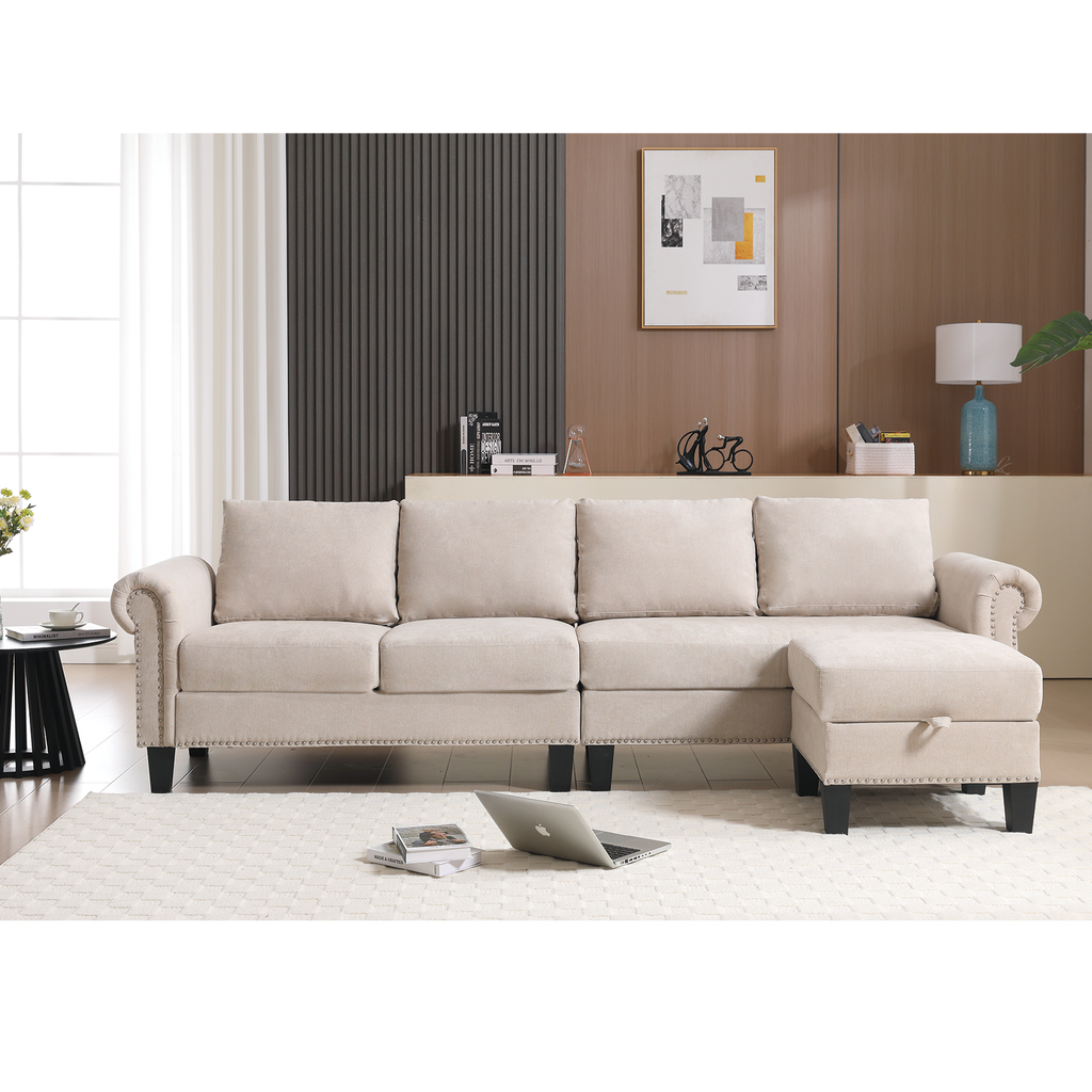 Beige L-shaped sectional sofa with corner chaise, multiple back cushions, dark feet.