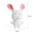 White bunny-shaped plush dog toy with pink nose and stitched smile