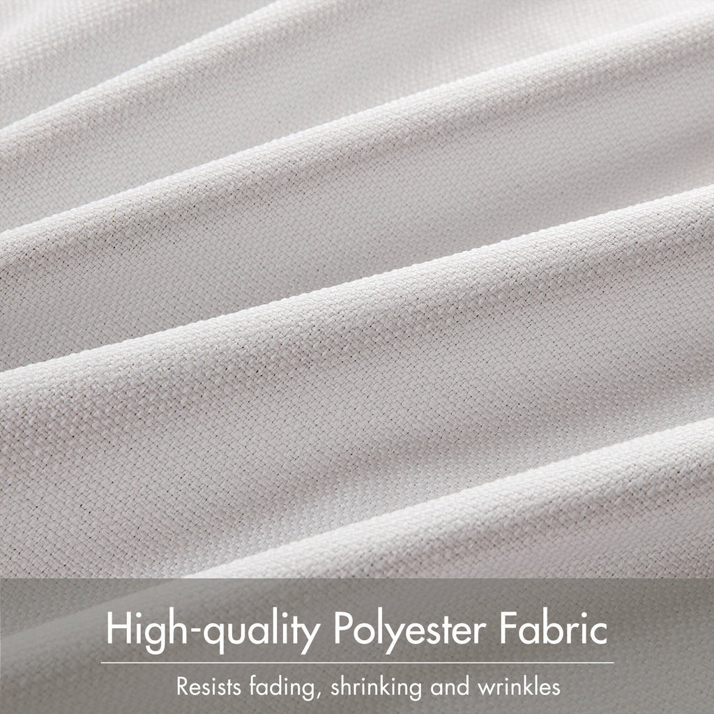 Close-up of white textured polyester curtain fabric with smooth layered surface