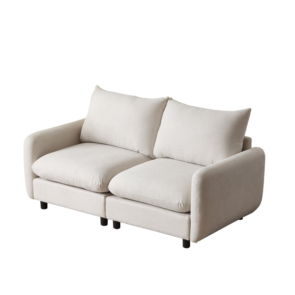 Modular sectional sofa corner chair with white upholstery, two back pillows, and wide track arms