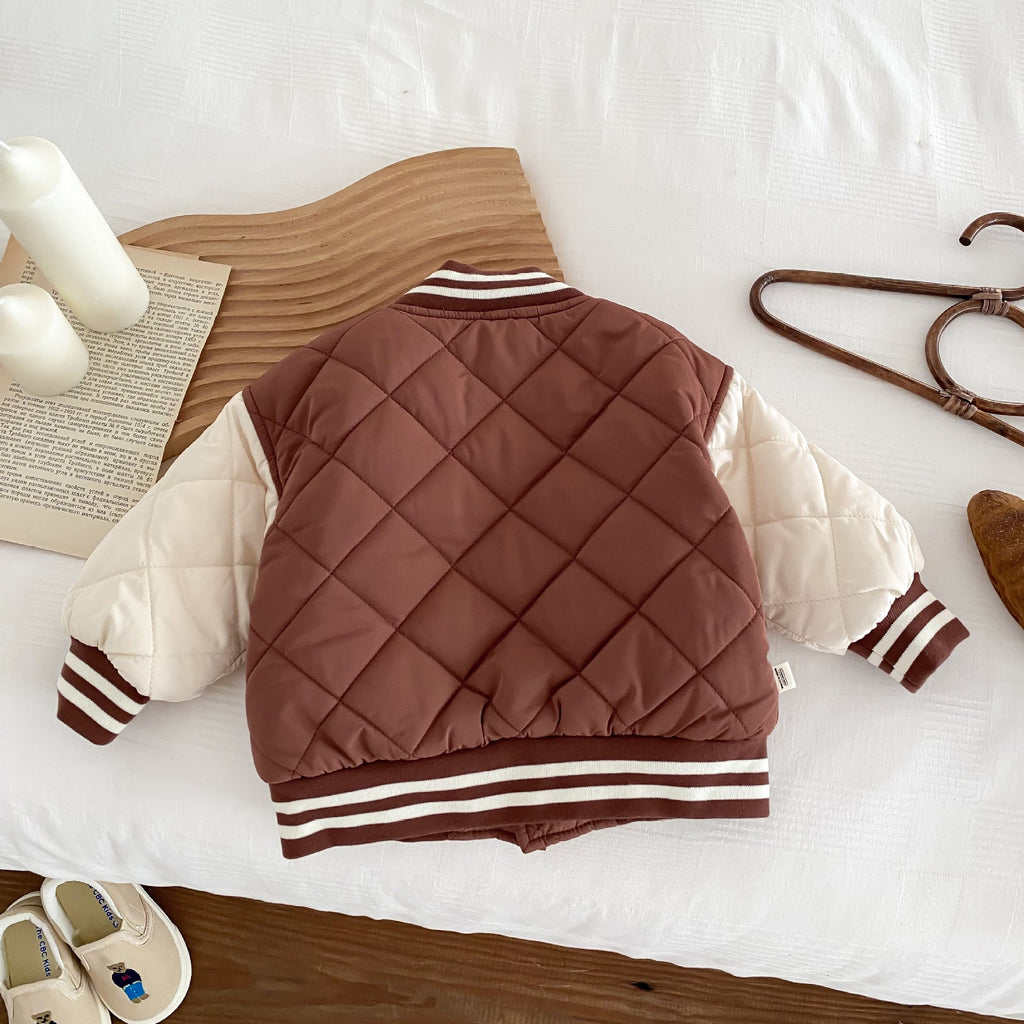 Kids reddish-brown quilted jacket back view with diamond stitching and striped ribbed hem