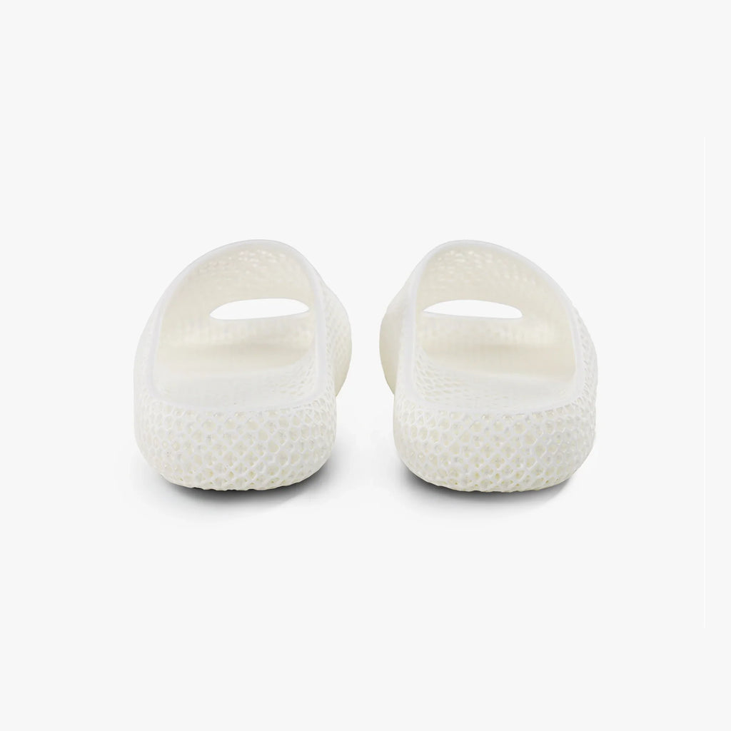 White 3D printed slippers with open toe cutout and textured slip-on design