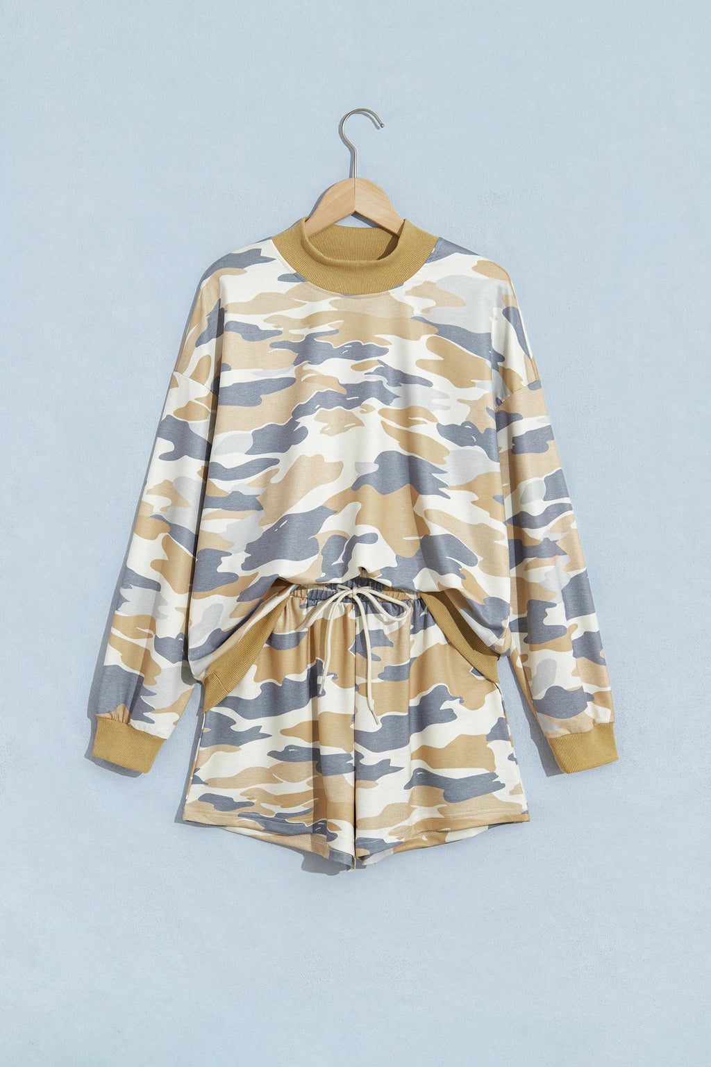 Camo two-piece set on hanger: mock neck long-sleeve top and drawstring shorts
