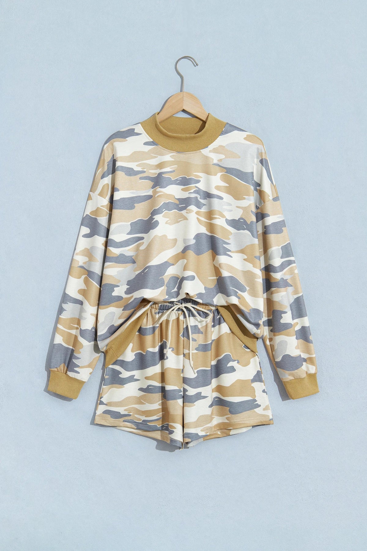 Camo two-piece set on hanger: mock neck long-sleeve top and drawstring shorts