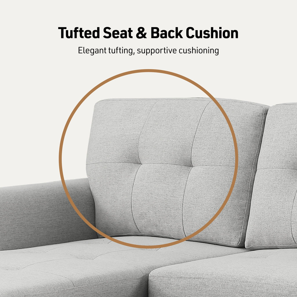 Light gray tufted seat and back cushion with stitched paneling