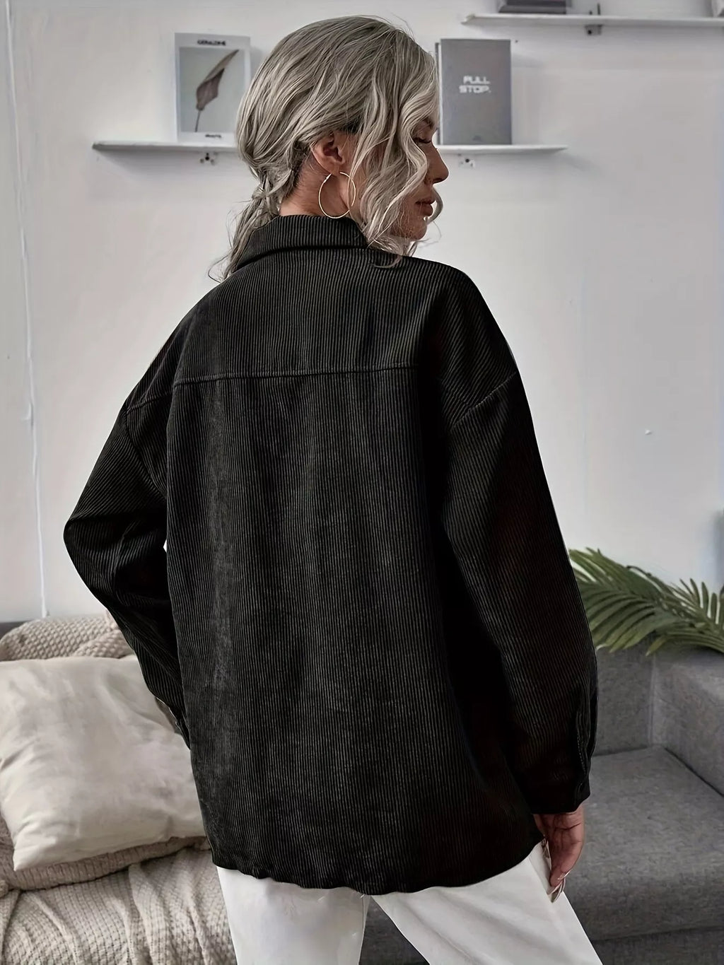 Black corduroy button-up shacket with long sleeves, back view