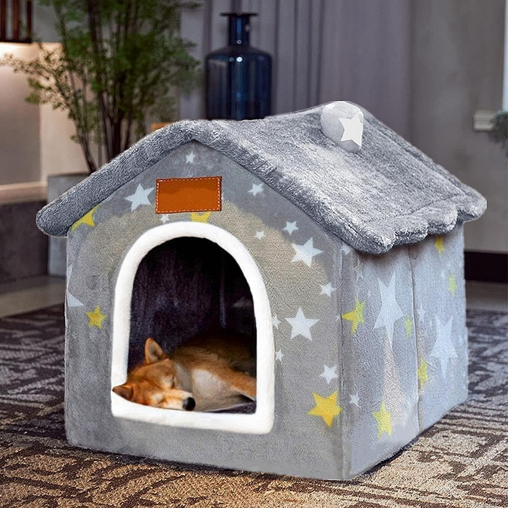 Gray indoor dog house bed with star pattern and white arched entrance, dog resting inside.