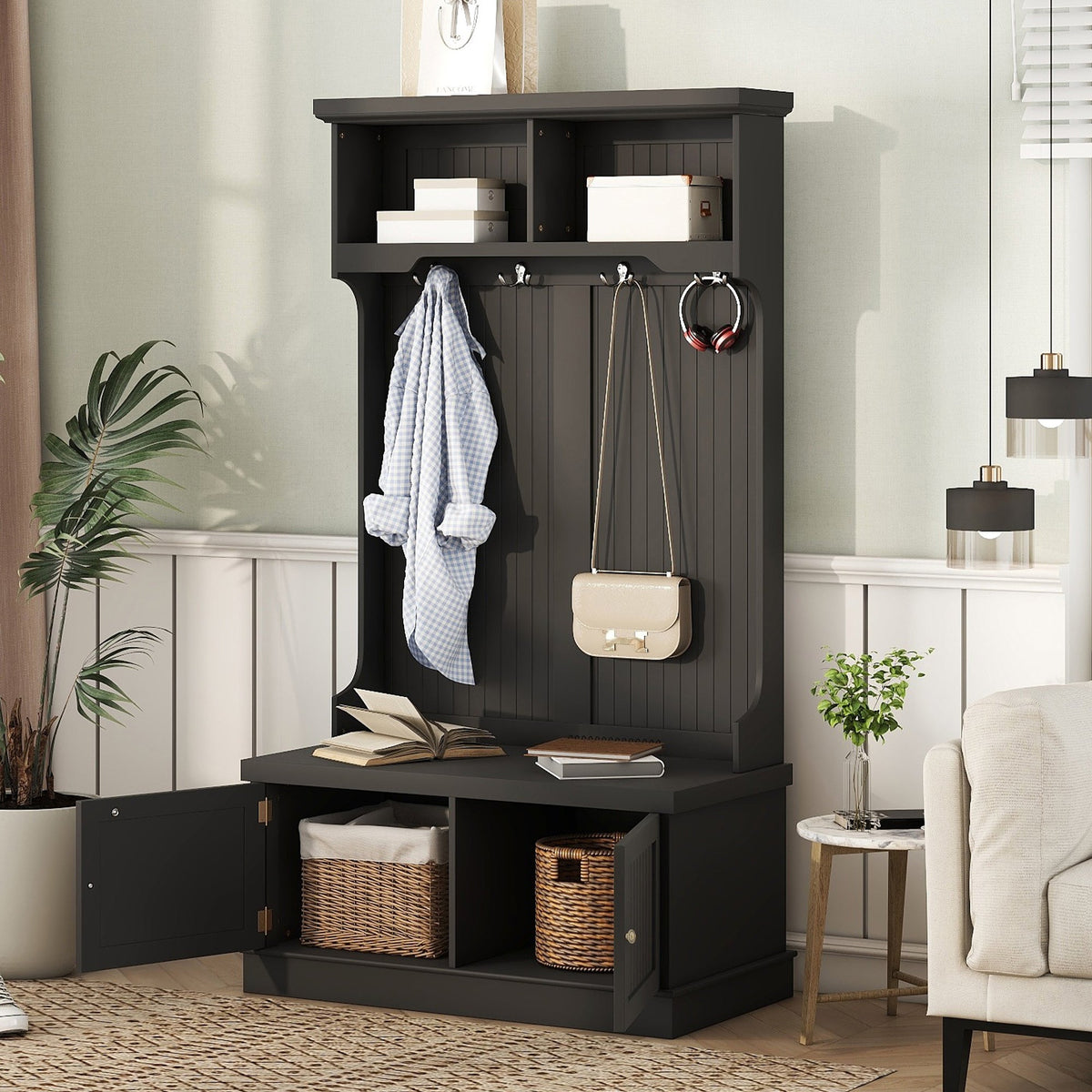 Black hall tree in entryway with coat hooks, top shelf, and shoe storage bench.