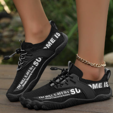 Black lace-up water shoes with white lettering and grippy tread sole