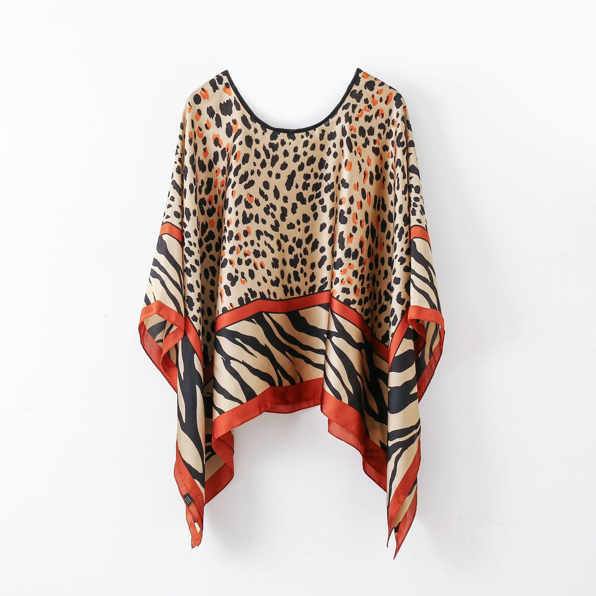 Leopard print pullover shawl cover-up with zebra stripe and rust accent border