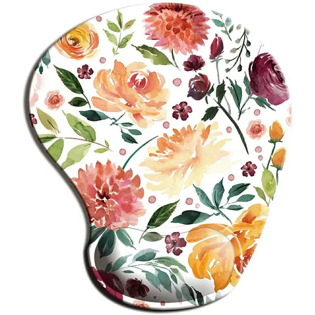 Ergonomic mouse pad wrist rest with colorful floral print and curved wrist cutout