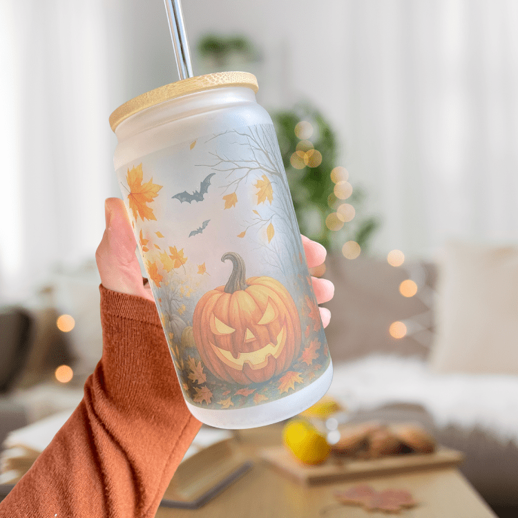 Frosted Halloween tumbler with straw and fall pumpkin, leaf, and bat print