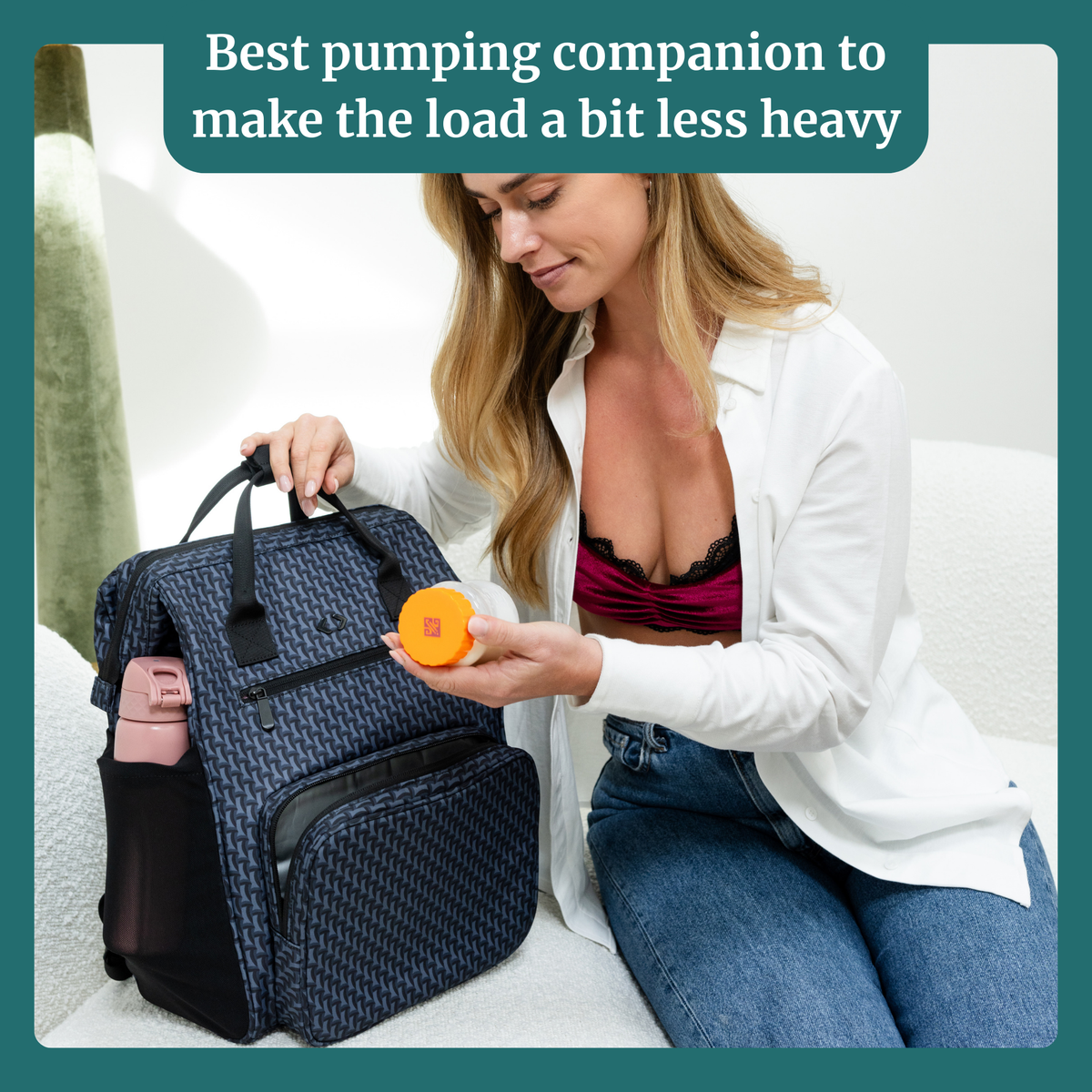 Navy patterned breast pump bag backpack with insulated front pocket and carry handle