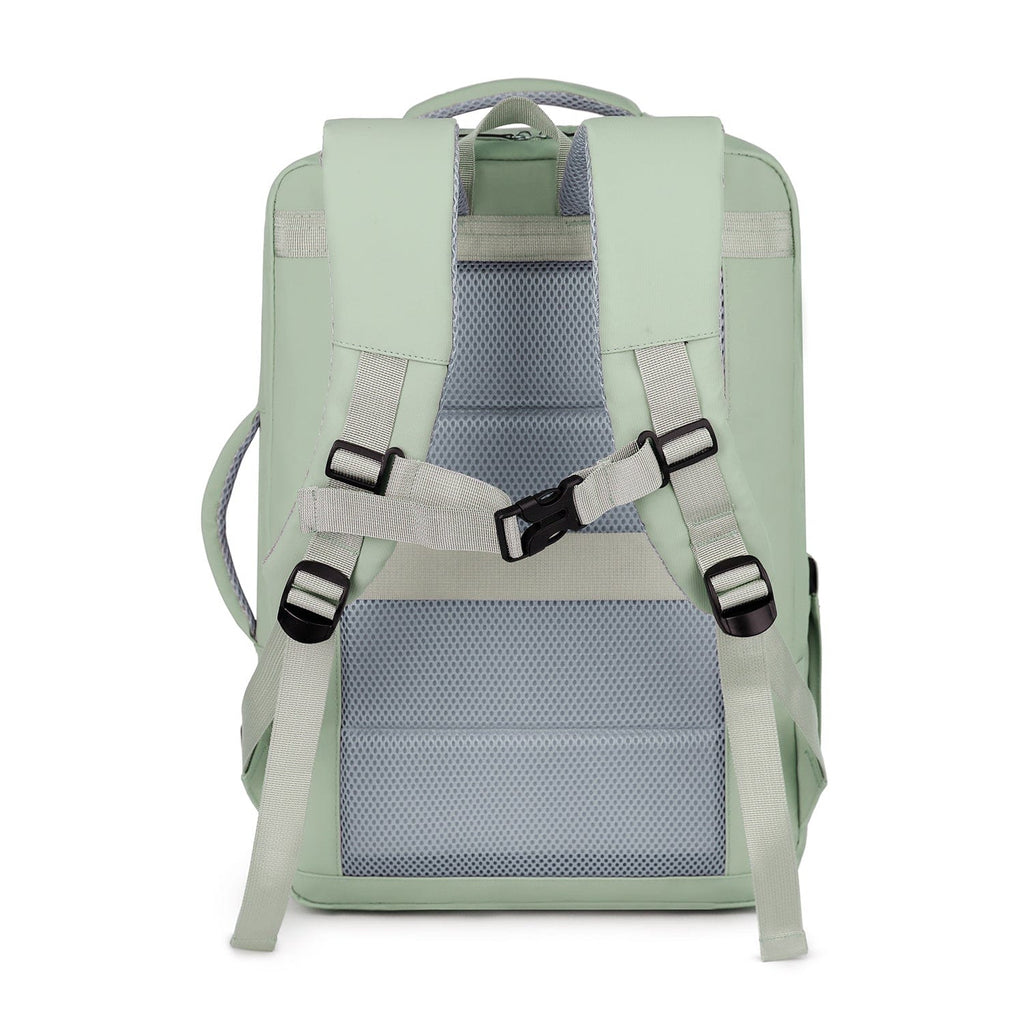 Mint green backpack with front straps and mesh-lined back panel.